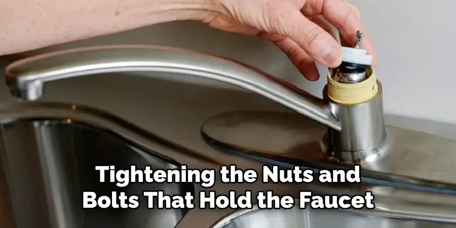 Tightening the Nuts and
Bolts That Hold the Faucet