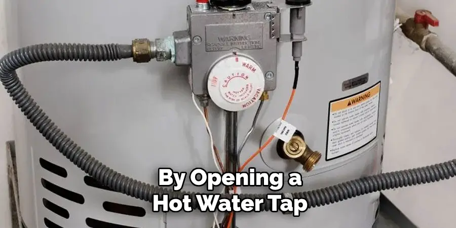 By Opening a
Hot Water Tap