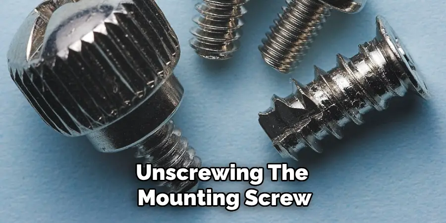 Unscrewing the Mounting Screw