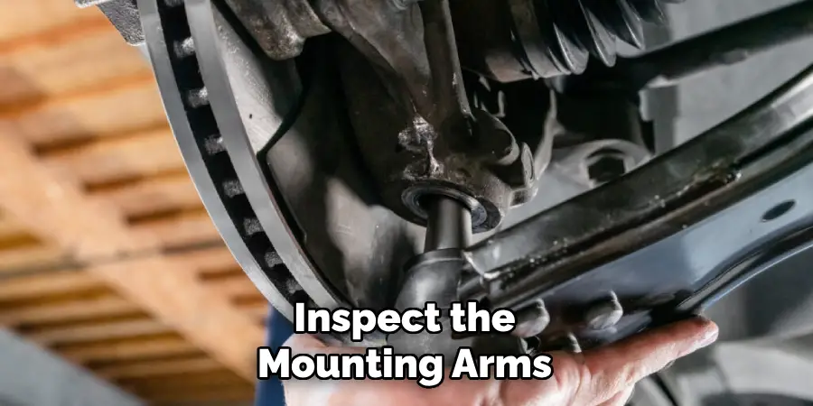 Inspect the
Mounting Arms