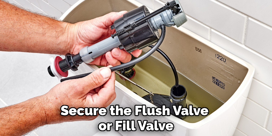 Secure the Flush Valve or Fill Valve