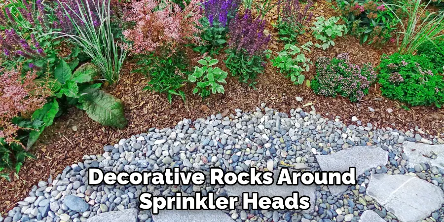 Place Paver Stones or Decorative Rocks Around Sprinkler Heads