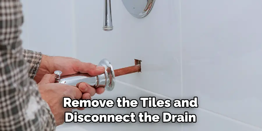 Remove the Tiles and
Disconnect the Drain