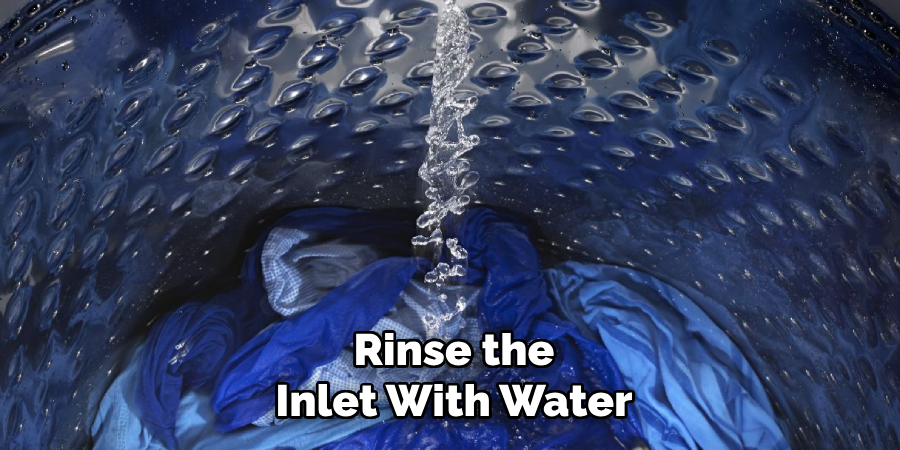 Rinse the
Inlet With Water