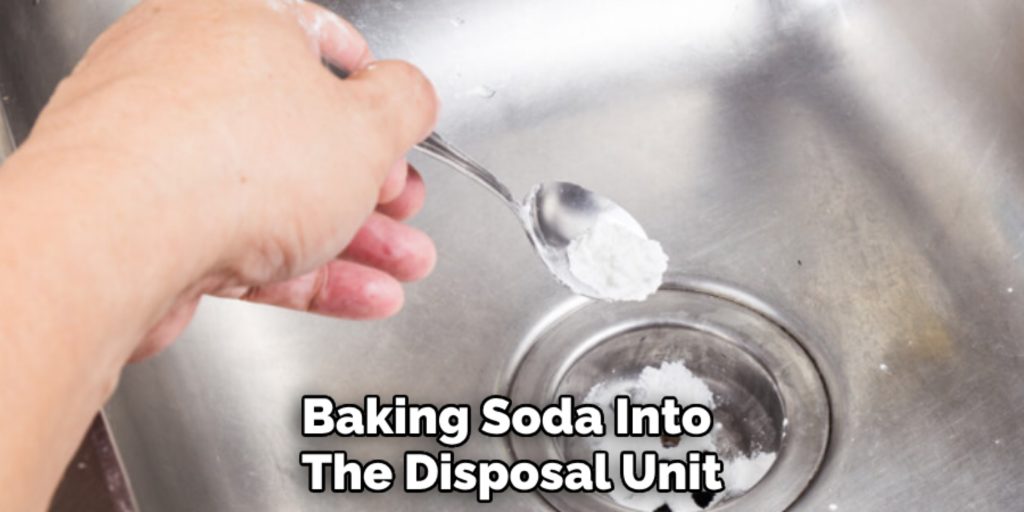 Baking Soda Into 
The Disposal Unit