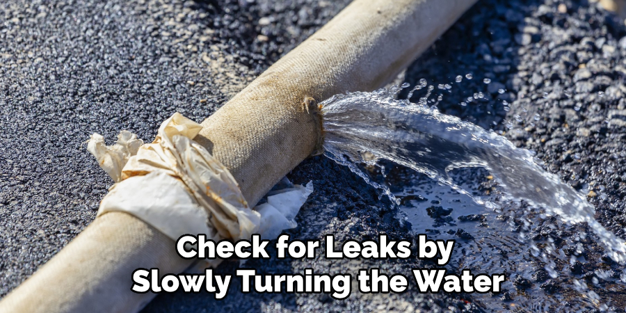 Check for Leaks by 
Slowly Turning the Water