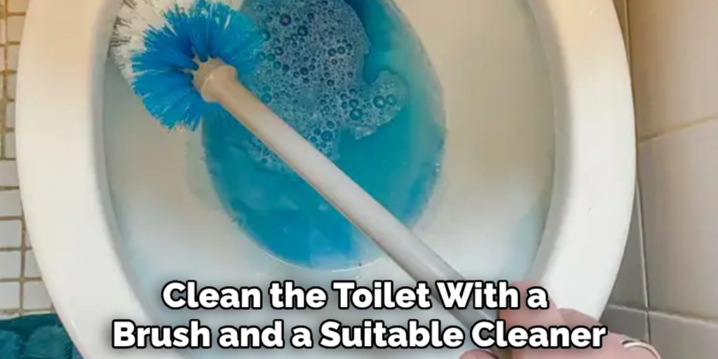 Clean the Toilet With a 
Brush and a Suitable Cleaner