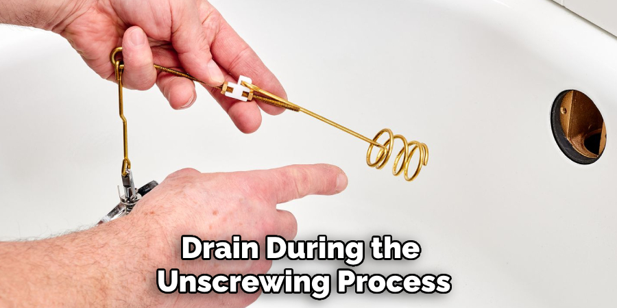 Drain During the 
Unscrewing Process