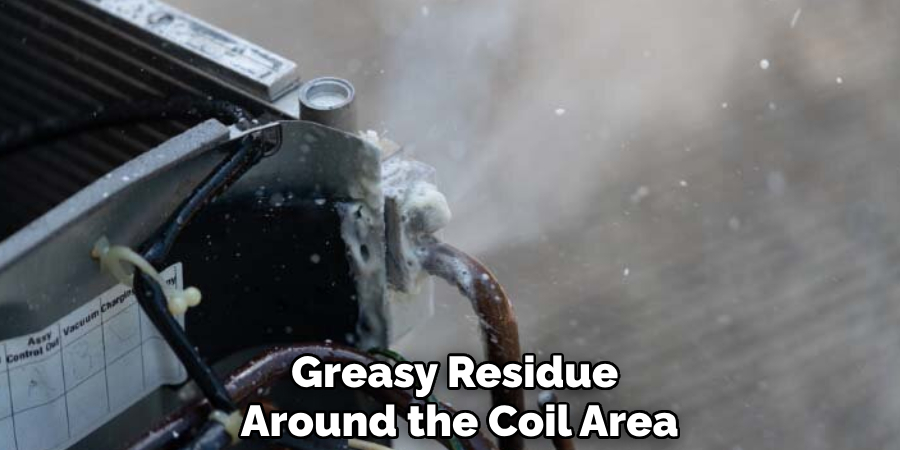 Greasy Residue 
Around the Coil Area