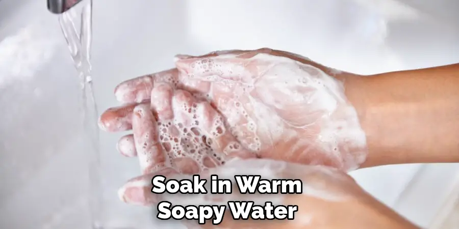 Soak in Warm Soapy Water 