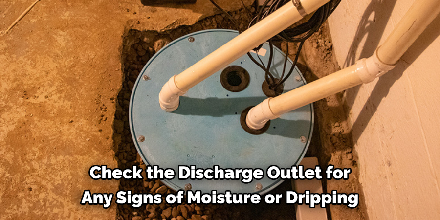 Check the Discharge Outlet for Any Signs of Moisture or Dripping