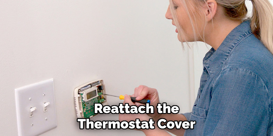 Reattach the Thermostat Cover
