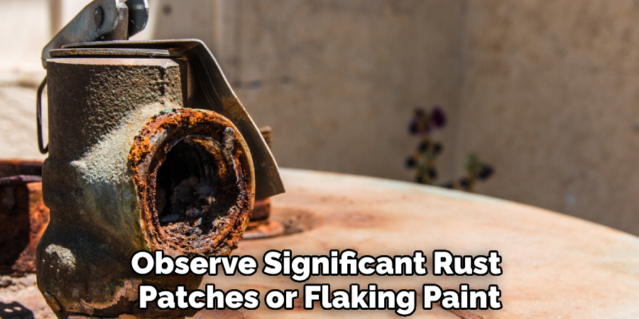 Observe Significant Rust 
Patches or Flaking Paint