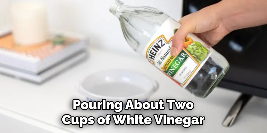 Pouring About Two
Cups of White Vinegar