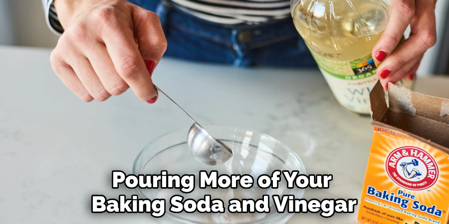 Pouring More of Your 
Baking Soda and Vinegar