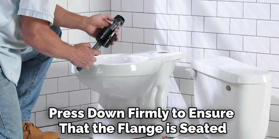 Press Down Firmly to Ensure 
That the Flange is Seated