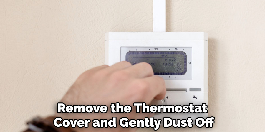 Remove the Thermostat 
Cover and Gently Dust Off