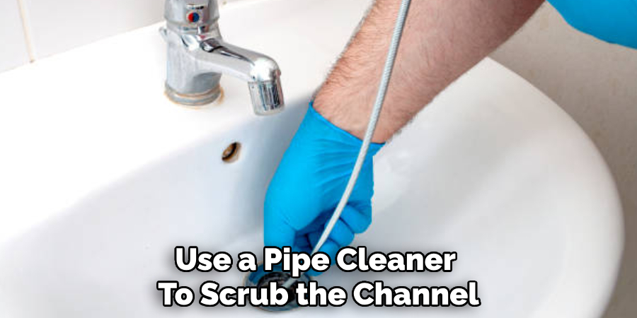 Use a Pipe Cleaner 
To Scrub the Channel