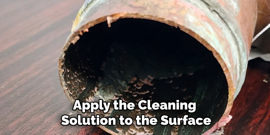 Apply the Cleaning 
Solution to the Surface