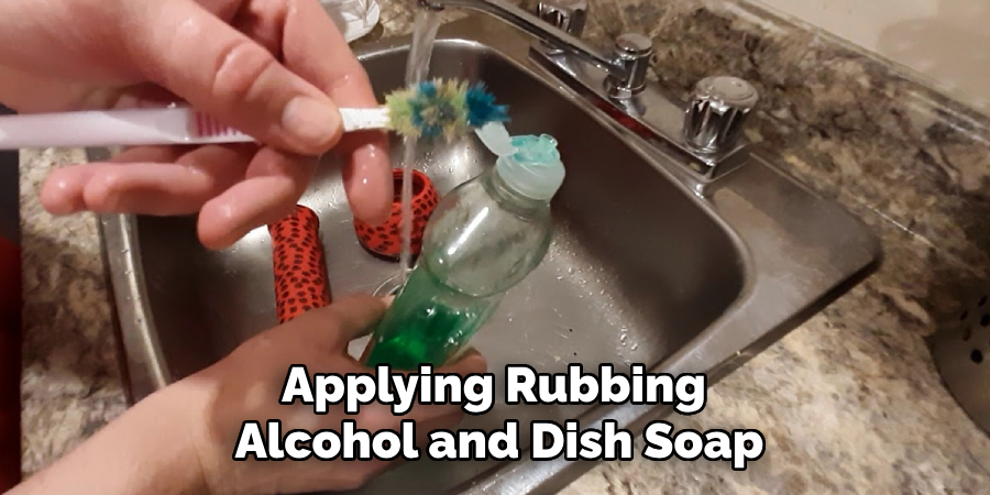 Applying Rubbing 
Alcohol and Dish Soap