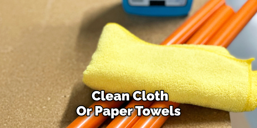 Clean Cloth 
Or Paper Towels