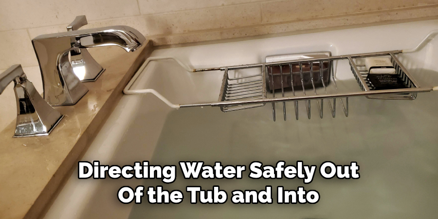 Directing Water Safely Out
Of the Tub and Into