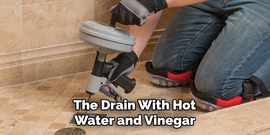 The Drain With Hot
Water and Vinegar