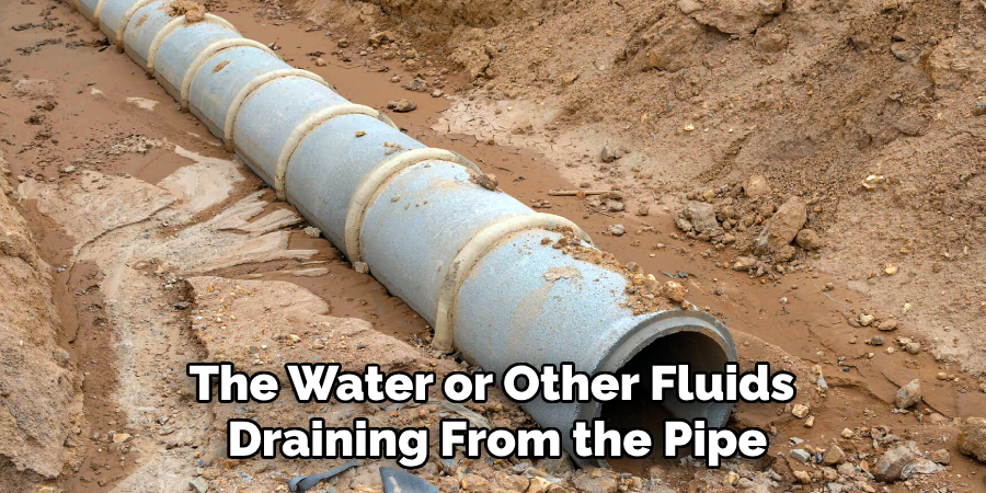 The Water or Other Fluids 
Draining From the Pipe