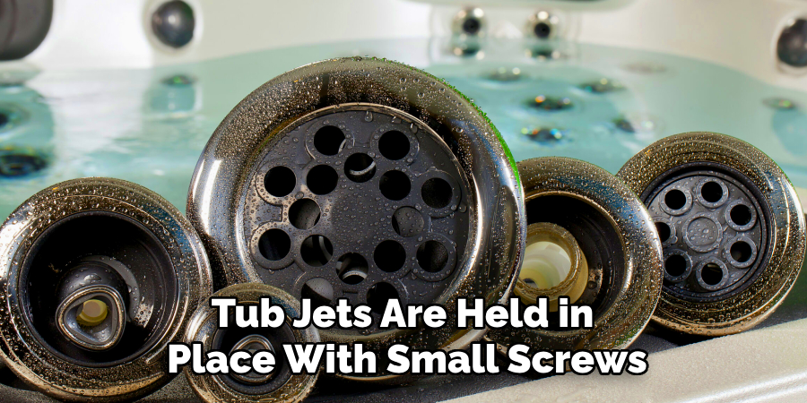 Tub Jets Are Held in
Place With Small Screws
