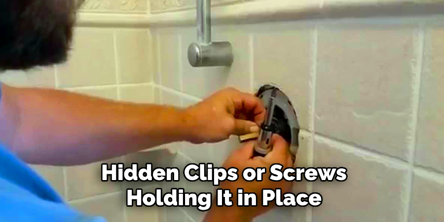 Hidden Clips or Screws
Holding It in Place