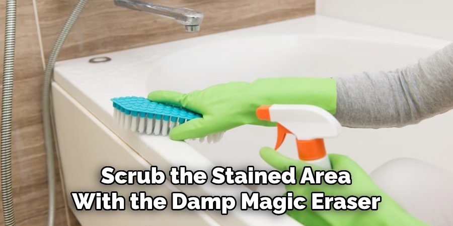 Scrub the Stained Area
With the Damp Magic Eraser
