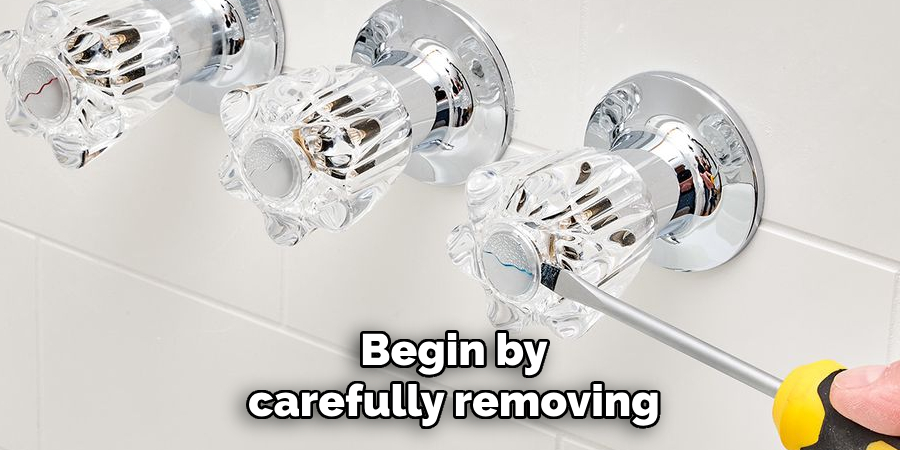 Begin by
carefully removing