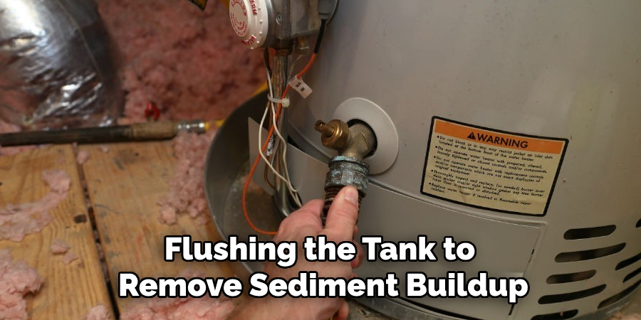 Flushing the Tank to
Remove Sediment Buildup
