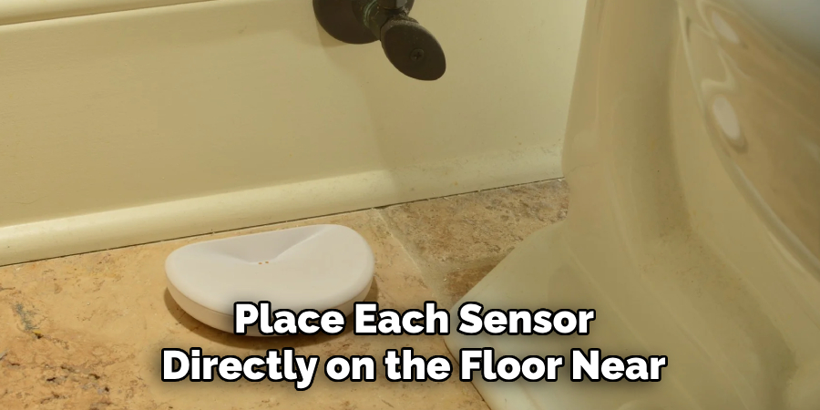Place Each Sensor
Directly on the Floor Near
