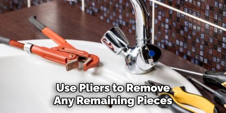 Use Pliers to Remove Any Remaining Pieces
