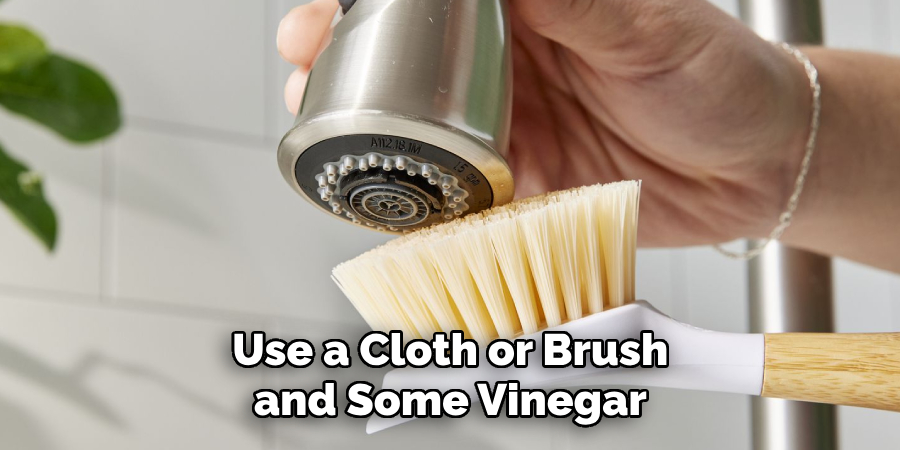 Use a Cloth or Brush and Some Vinegar