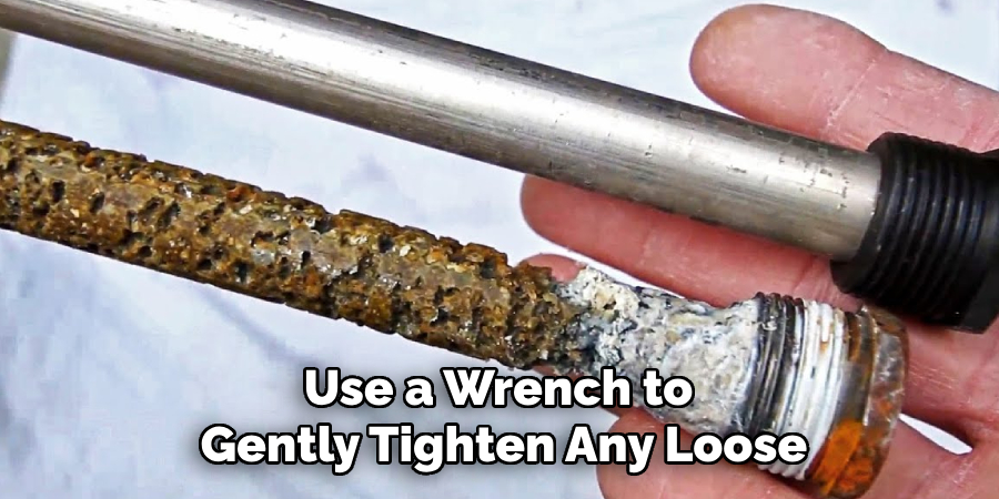 Use a Wrench to
Gently Tighten Any Loose