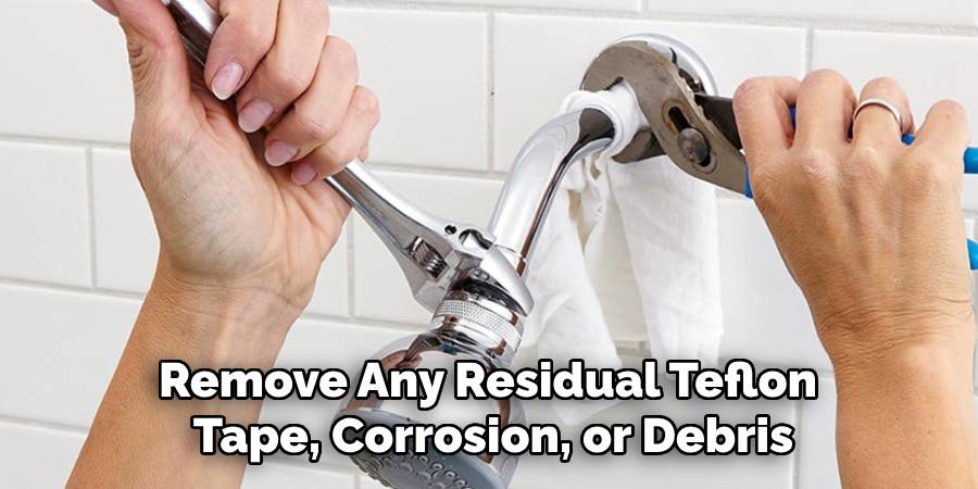 Remove Any Residual Teflon Tape, Corrosion, or Debris
