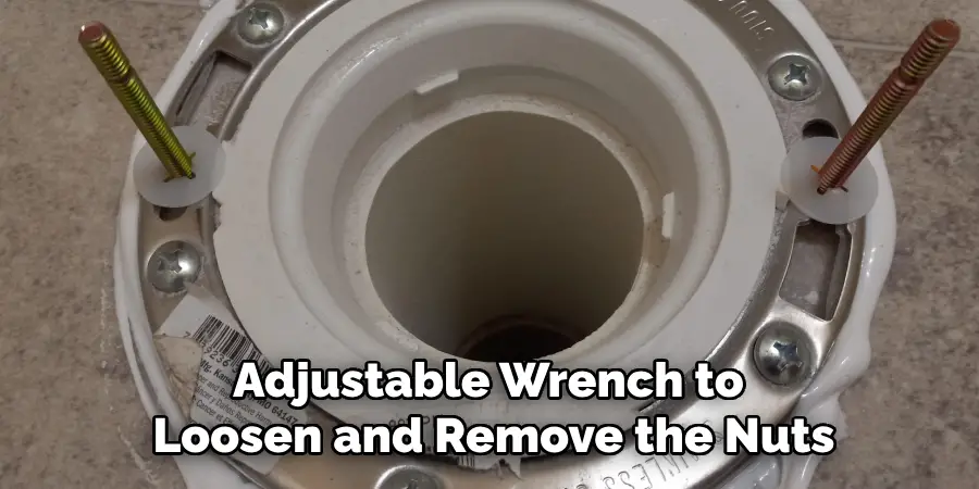 Adjustable Wrench to Loosen and Remove the Nuts