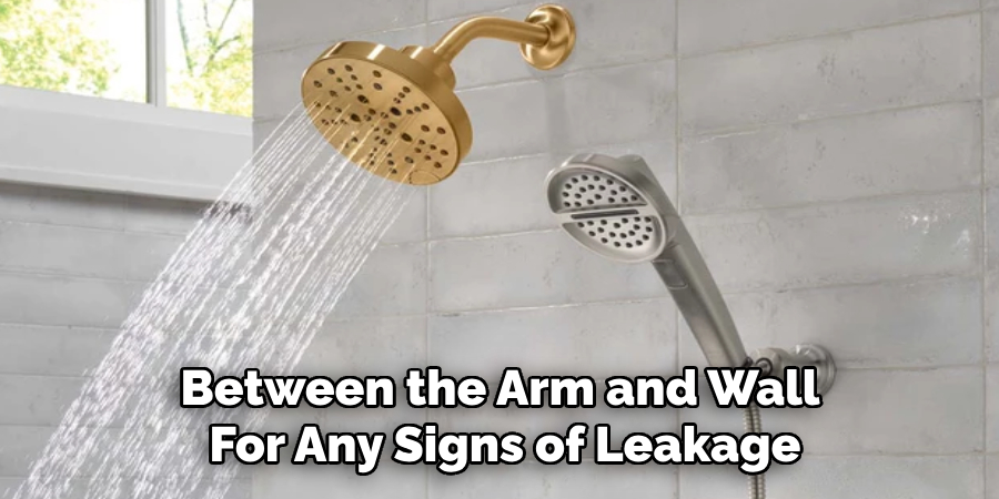 Between the Arm and Wall 
For Any Signs of Leakage