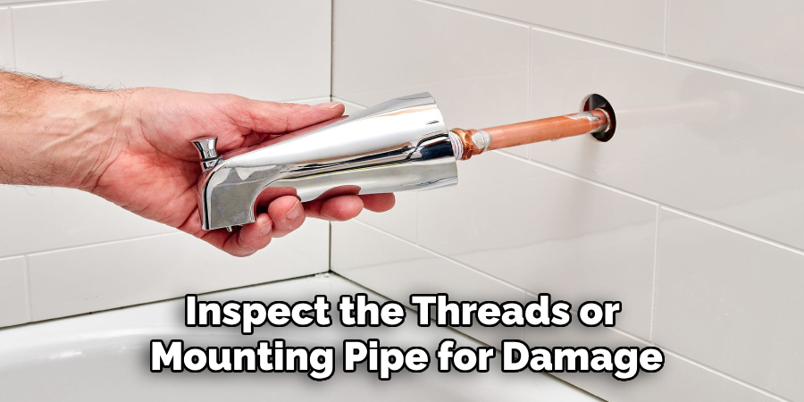 Inspect the Threads or
Mounting Pipe for Damage